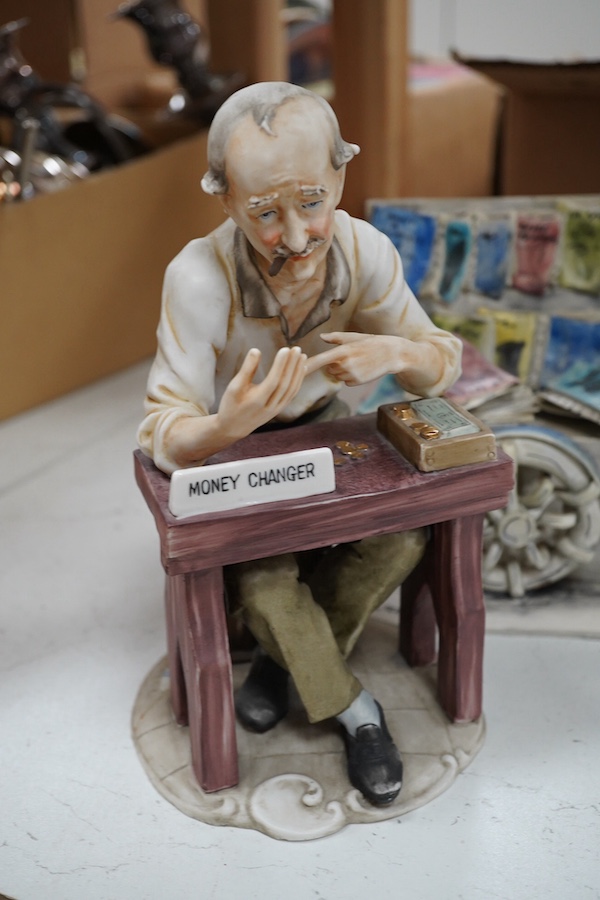 Four Italian ceramic figures to include Capodimonte money changer, 20cm. Condition - poor to fair